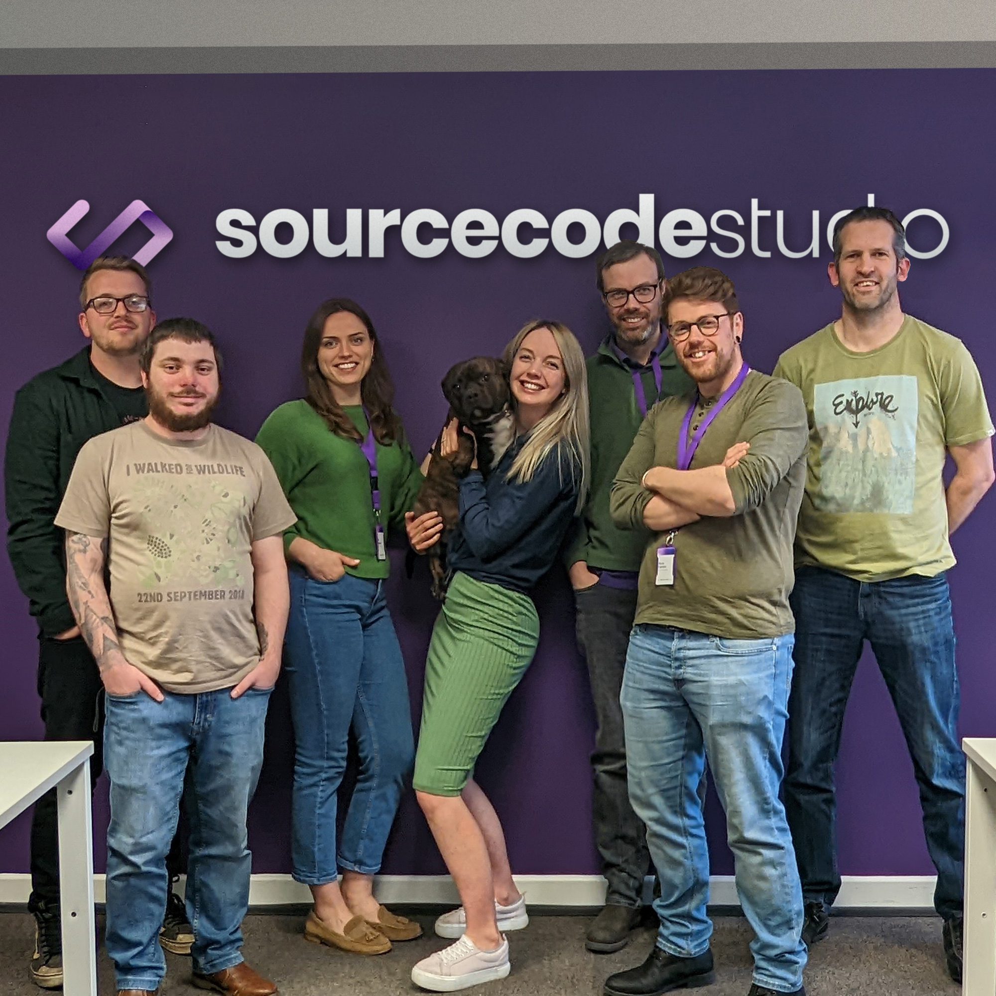 The SourceCodeStudio team wearing green for Earth Day 2022