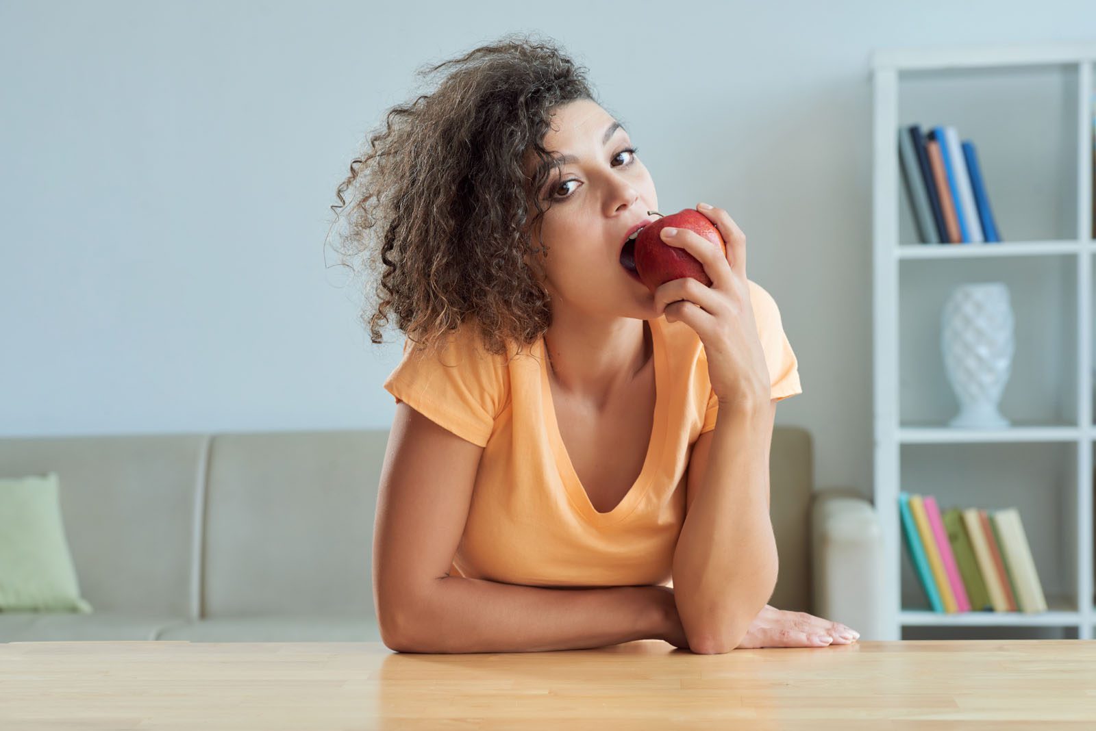 Woman eating an apple